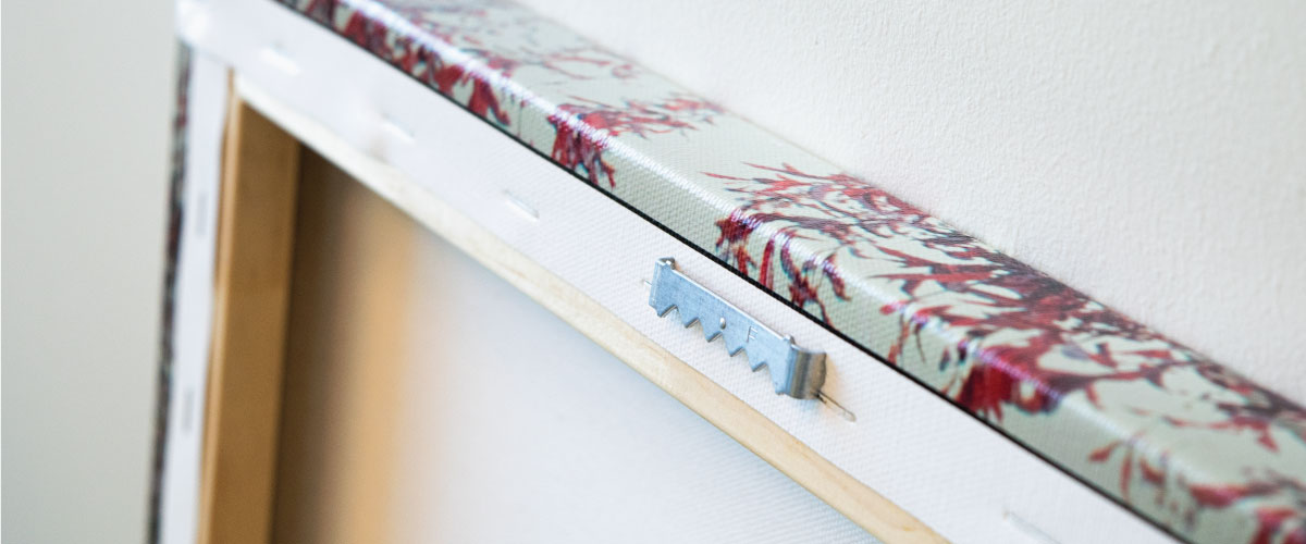 Sawtooth bracket on the back of a canvas print.